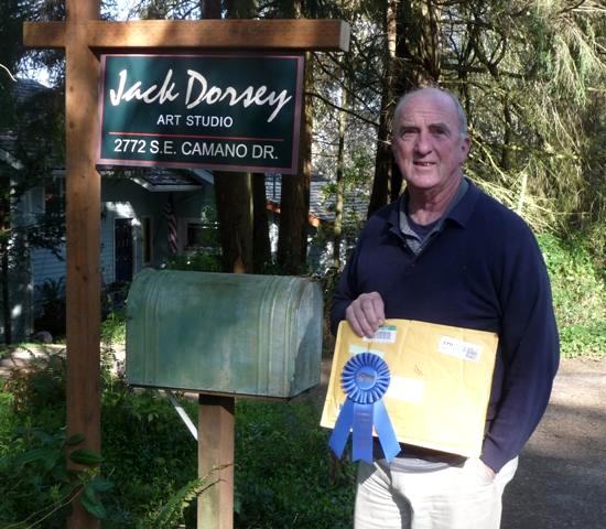 Jack Dorsey holding prize ribbon
